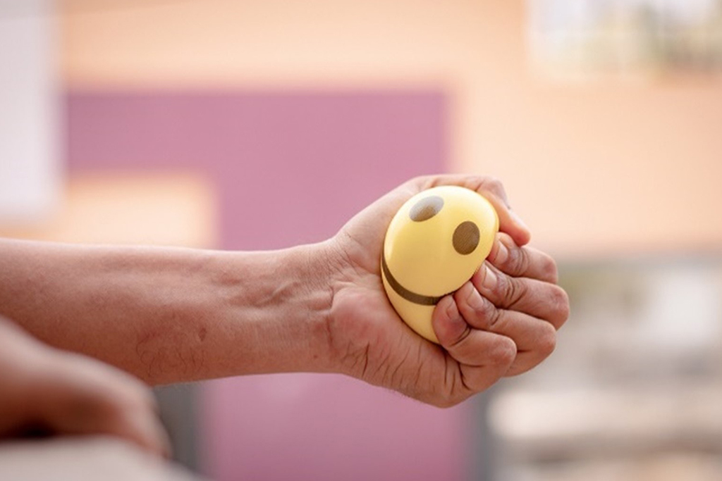 printed stress ball squeezed